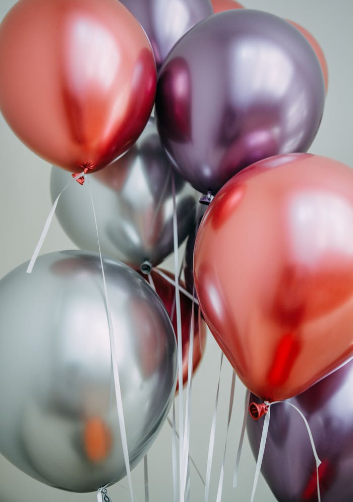 contact-header Colorful metallic balloons perfect for festive and party settings.